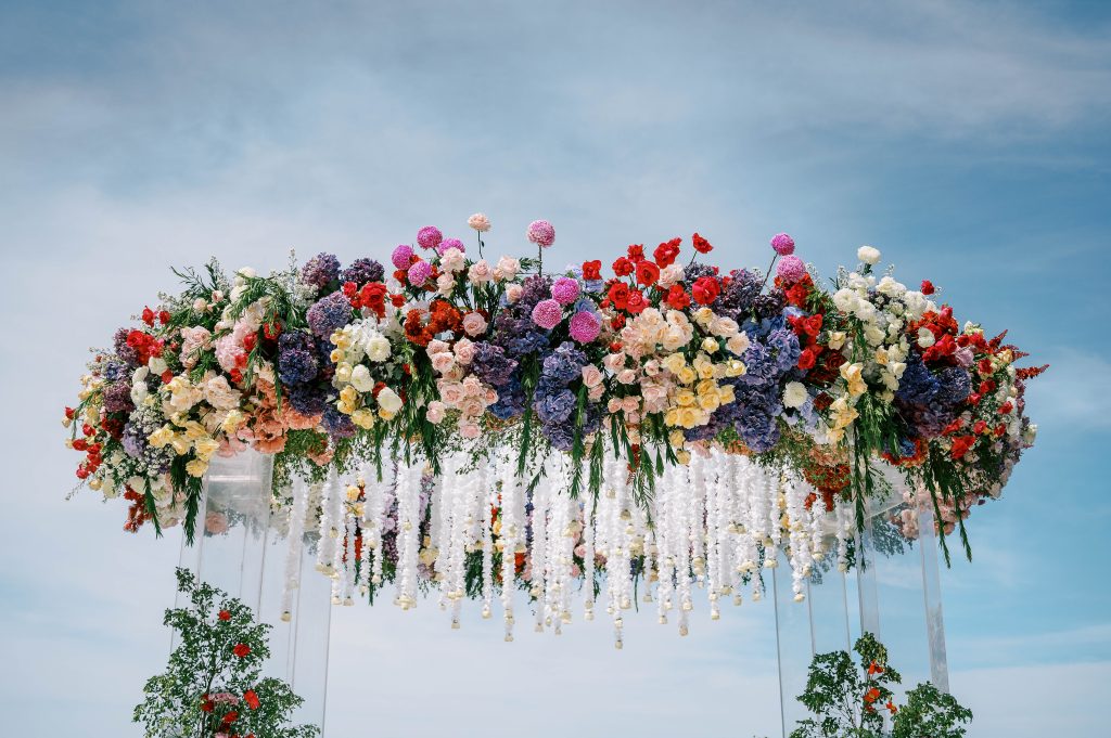 Acrylic mandap with hanging white florals