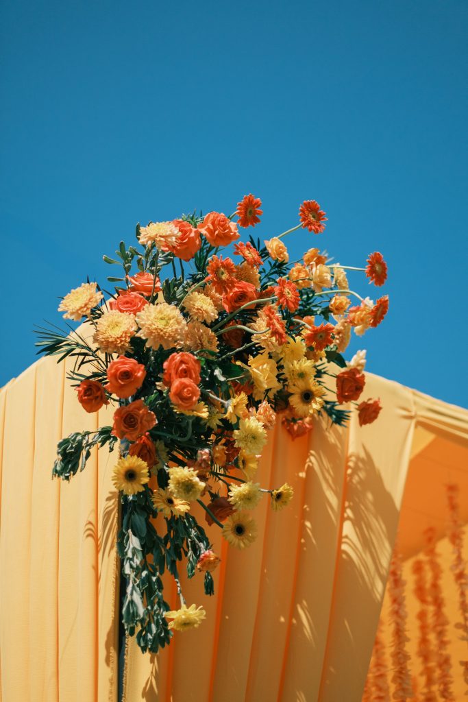 FIX floral arch with tropical wedding colors