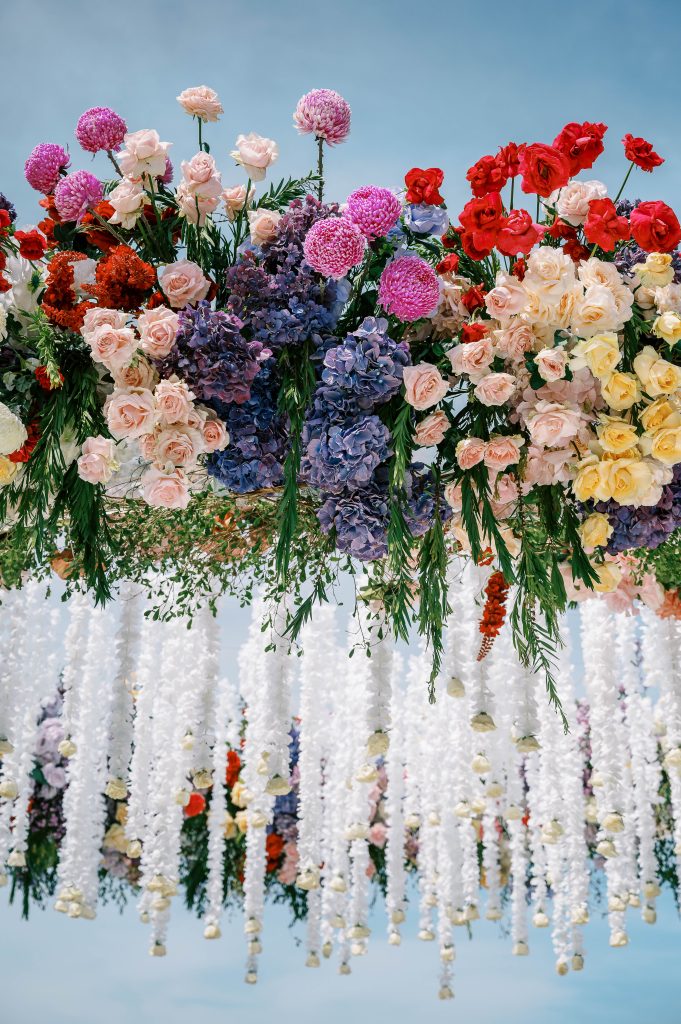 Jewel tone floral installation Bali wedding