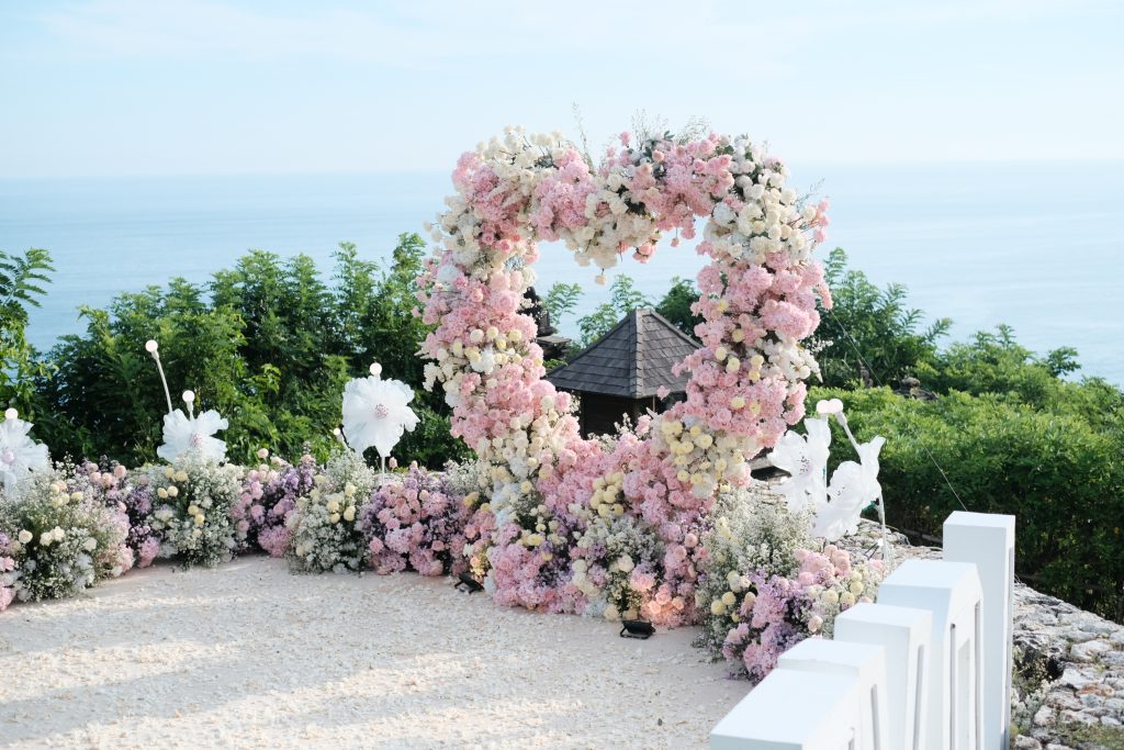 pink floral arch at Alila Uluwatu proposal