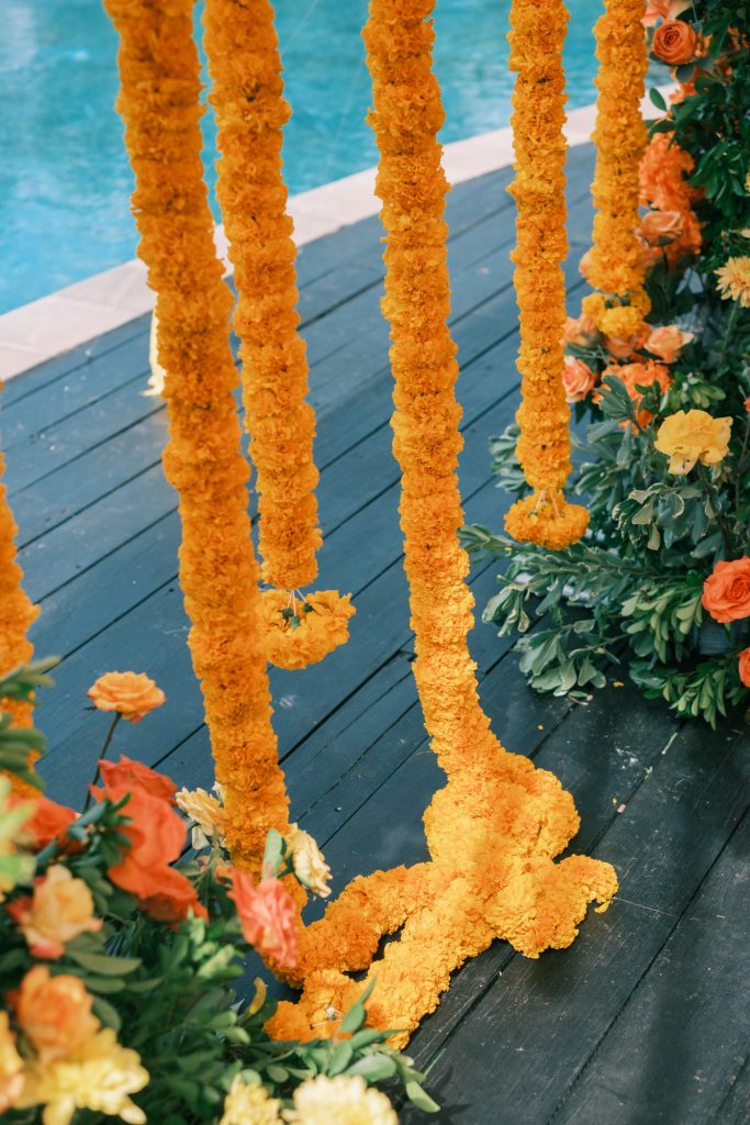 FIX tropical marigold floral wedding decor