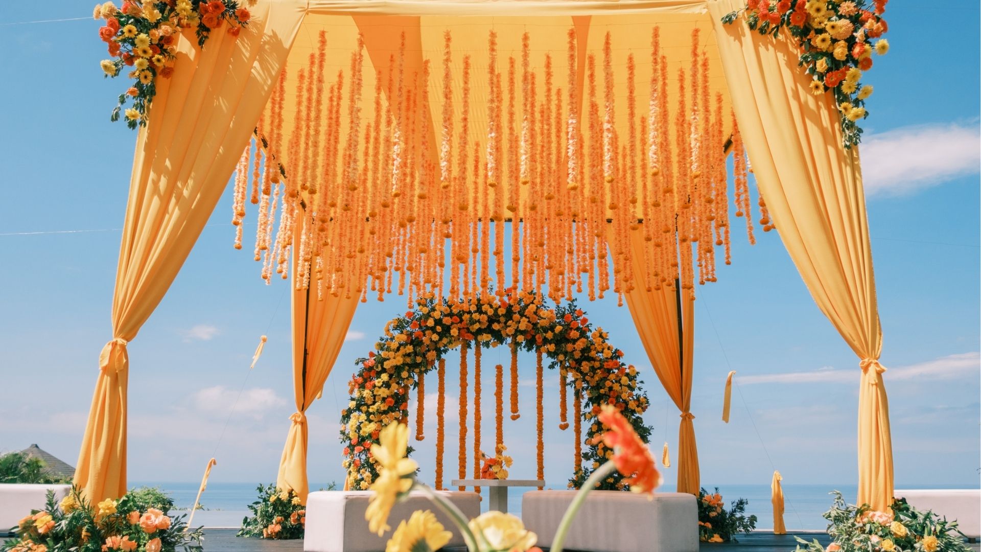 tropical marigold floral wedding decor