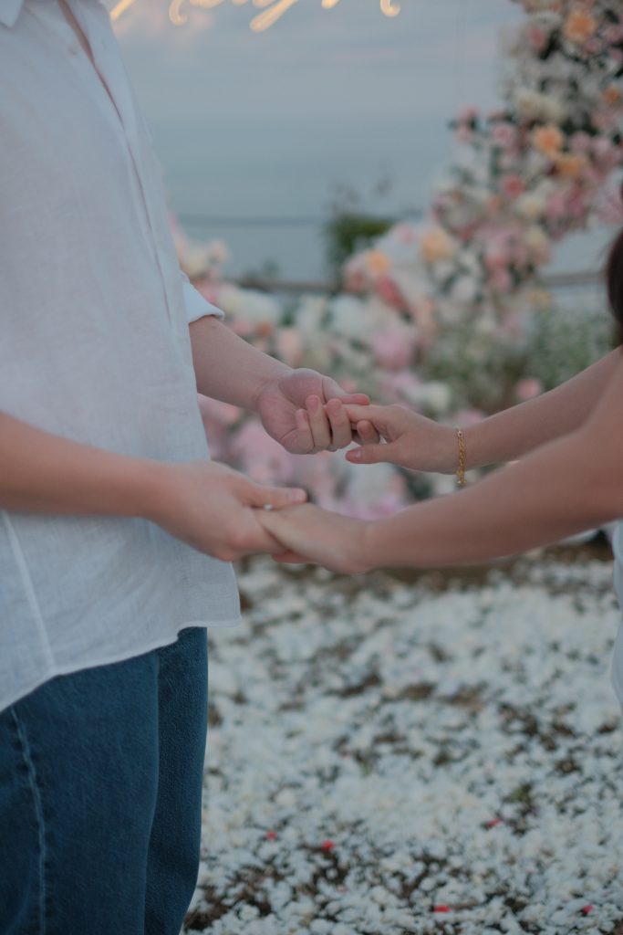 FIX Couple celebrating engagement at Karang Boma Cliff