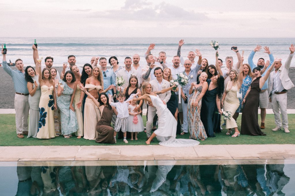 Guests Celebrating Beside Bali's Oceanfront Villa