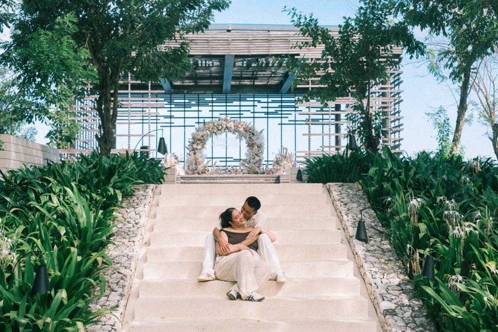 Pastel flowers framing Alila Uluwatu ocean view